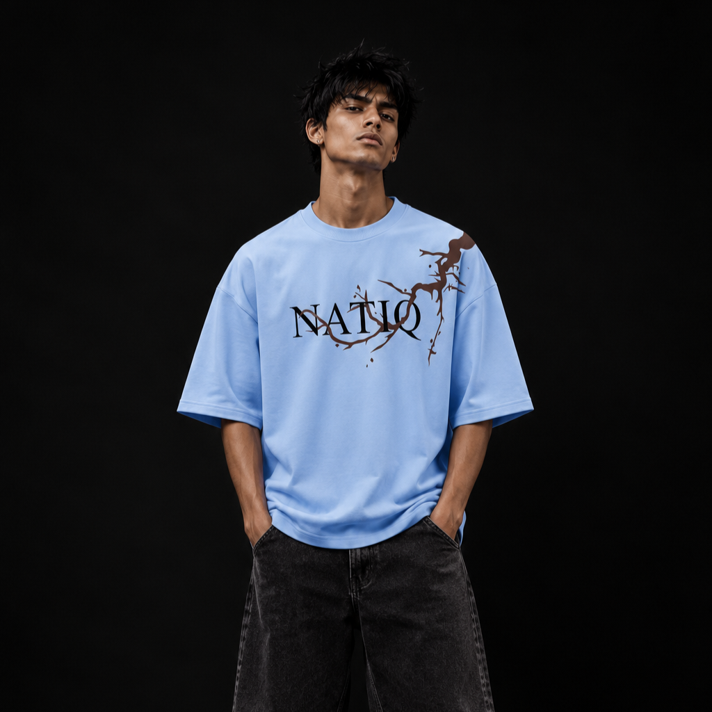 NATIQ oversized graphic T-shirt front flat lay with signature front artwork