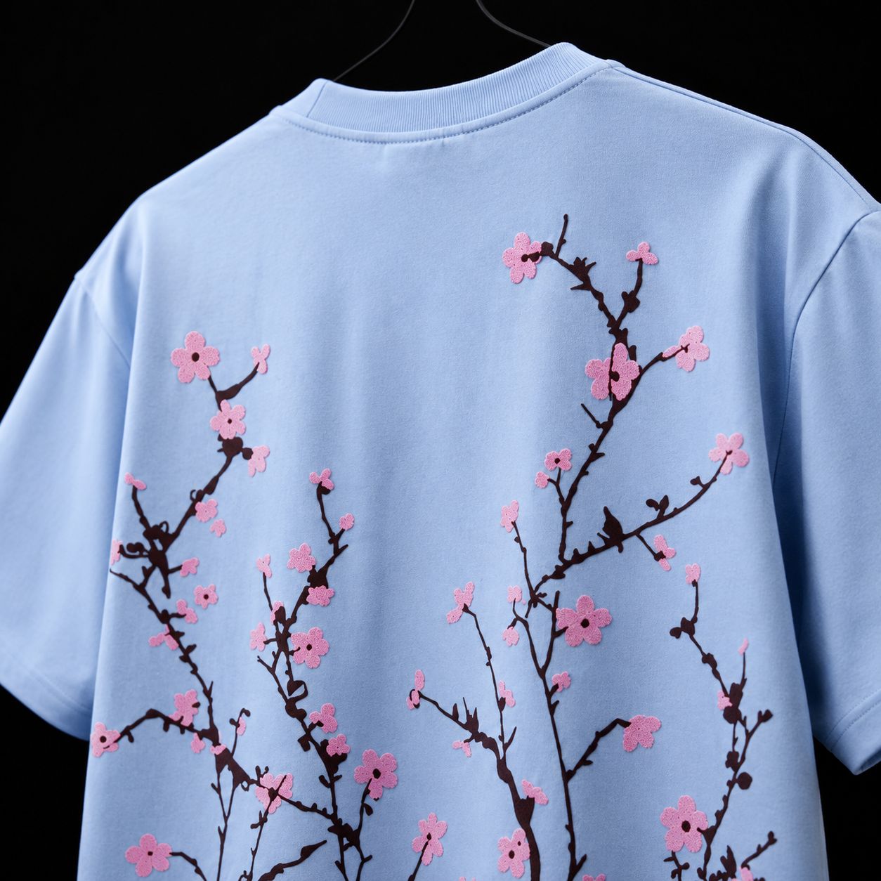 Close-up of premium floral blossom back print on NATIQ Terry Cotton oversized T-shirt
